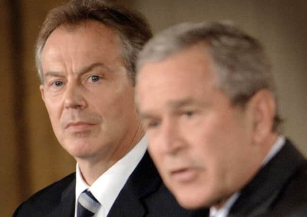 File photo of Tony Blair and George W Bush in 2006. Picture: PA