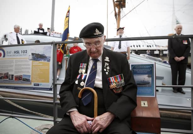 A British veteran listens to the prayer service at Portsmouth Historic Dockyard. Picture: Getty