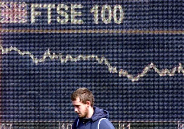 The FTSE 100 index gained 19.59 points or 0.3 per cent. Picture: AP