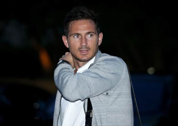 Frank Lampard arrives in Florida with the England team in preparation for the World Cup. Picture: Getty