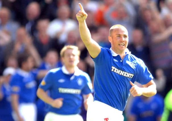 Kenny Miller celebrates a goal for Rangers in 2010. He is set to return to the club for his third spell at Ibrox. Picture: Ian Rutherford