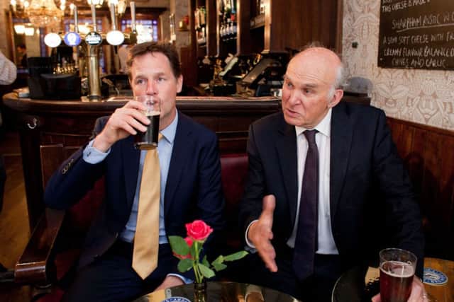 Deputy Prime Minster Nick Clegg  shares a pint with  Vince Cable at a pub in London Picture: Getty