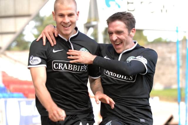 James Collins celebrates a goal against St Johnstone with Paul Heffernan. Picture: TSPL