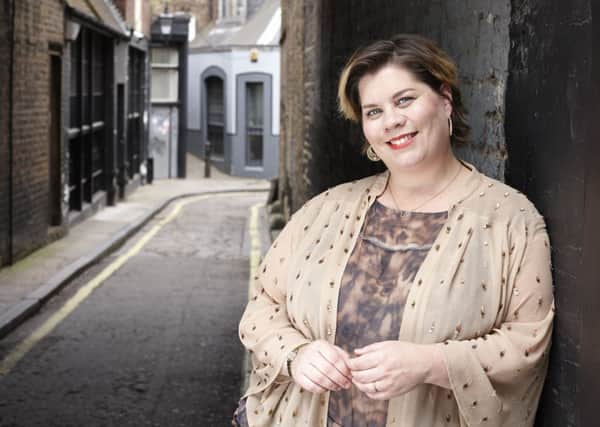 Katy Brand is relaxing after publishing her debut novel and starring in romcom musical Walking on Sunshine. Picture: Debra Hurford Brown