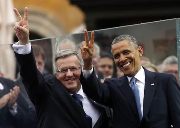 US President Barack Obama and Polish President Bronislaw Komorowski in Warsaw. Picture: Reuters