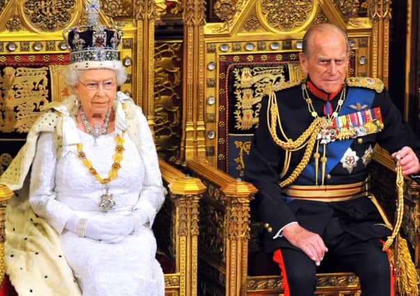 The Queen with the Duke of Edinburgh as she delivers her speech during the State Opening of Parliament. Picture: Getty