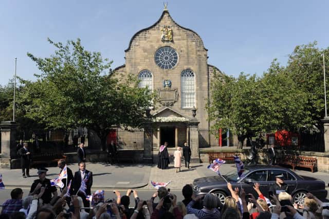 The Queen and Prince Phillip arrive at Canongate Kirk in 2011. Picture: Ian Rutherford
