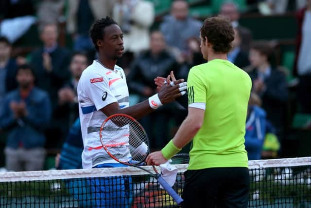 Andy Murray shakes hands with Gael Monfils after the match. Picture: Getty