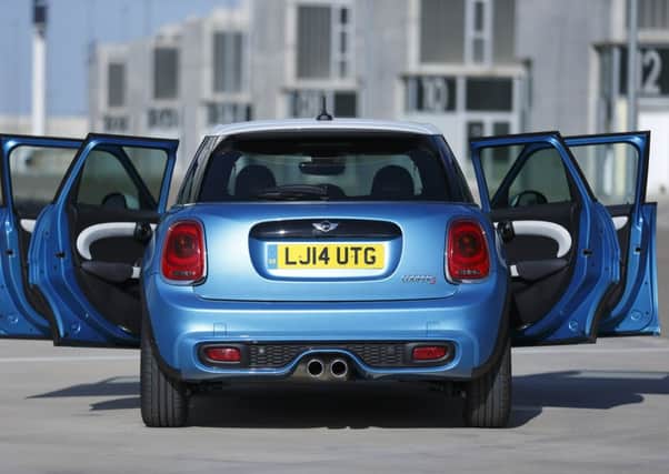 The five-door Mini hatchback uses a longer and wider bodyshell than its three-door stablemate