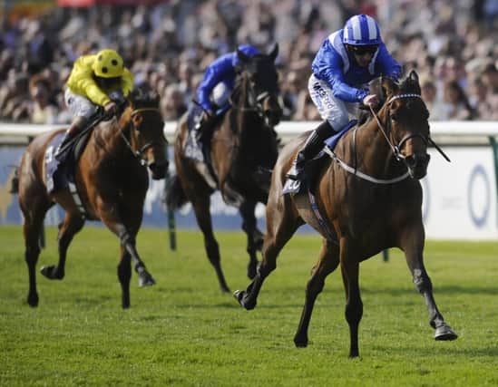 Paul Hanagan rides the Oaks hopeful Taghrooda to win The Tweenhills Pretty Polly Stakes at Newmarket last month. Picture: Getty