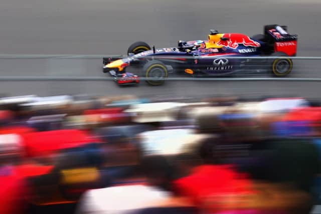Red Bulls Sebastian Vettel flashes by during yesterdays practice session in Montreal.  Picture: Getty
