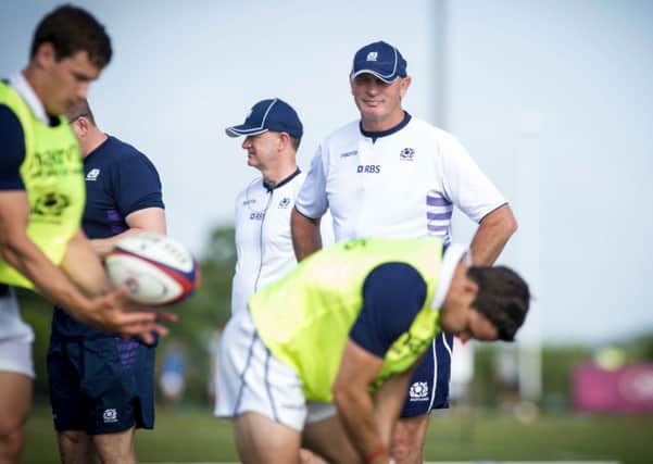 Vern Cotter supervises a training session as he prepares his players for his first match. Picture: SNS