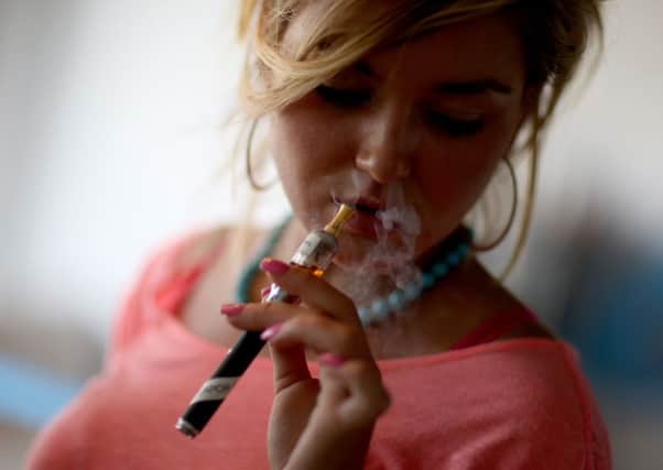 The NHS says people trying to quit smoking should not be told to stop using e-cigarettes. Picture: Getty