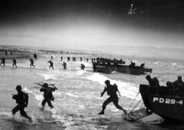 Troops hit the beaches of Normandy during the D Day invasion of World War Two. Picture: Contributed