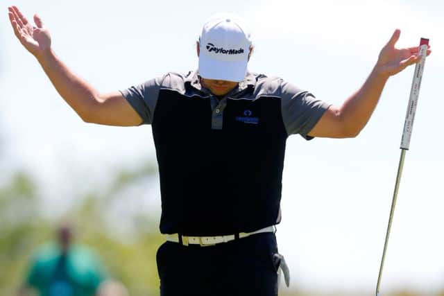 Mikael Lundberg reacts after holing a birdie putt yesterday. Picture: Getty