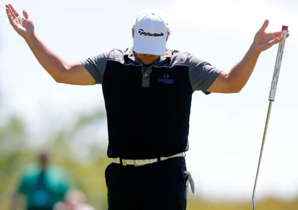 Mikael Lundberg reacts after holing a birdie putt yesterday. Picture: Getty