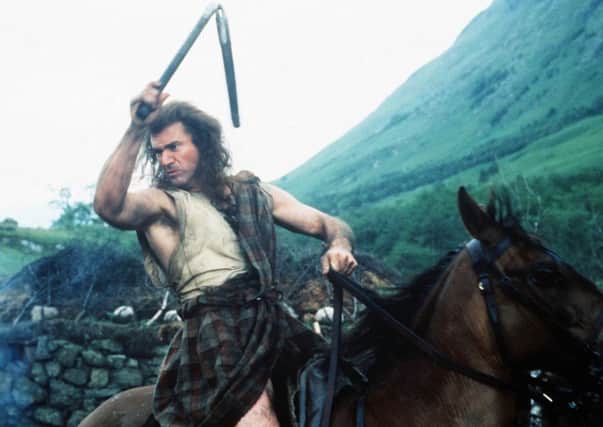 Mel Gibson in the saddle during an action sequence for the 1995 film, Braveheart. Picture: Kobal Collection