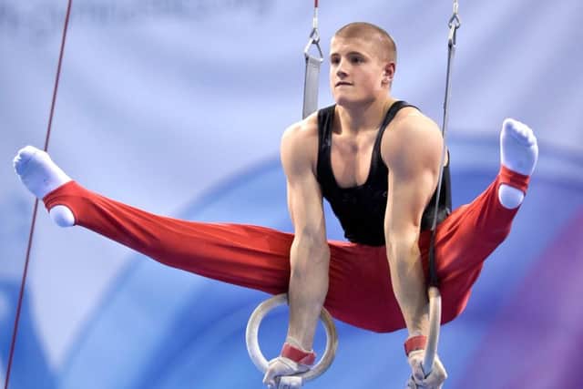 Scottish Commonwealth Games gymnast Frank Baines performs on the rings. Picture: Alan Edwards