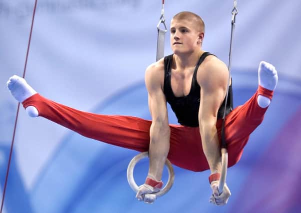 Scottish Commonwealth Games gymnast Frank Baines performs on the rings. Picture: Alan Edwards
