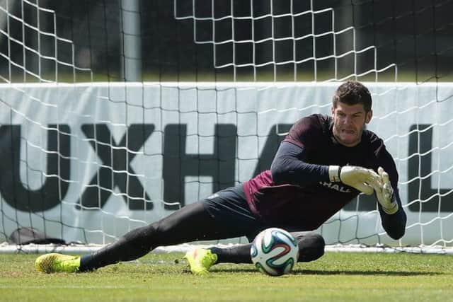 Fraser Forster is with England but Ronny Deila is hopeful of keeping the Englishman and Virgil van Dijk in Glasgow. Picture: Getty