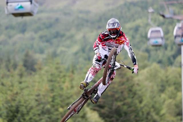Airborne: competitors at the Mountain Bike World Cup scaled the heights in Fort William. Picture: Gary Williamson