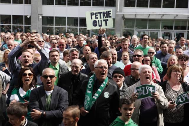 Hibs fans gathered at Easter Road calling for Rod Petrie to quit. Picture: Toby Williams