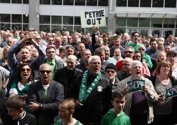 Hibs fans gathered at Easter Road calling for Rod Petrie to quit. Picture: Toby Williams