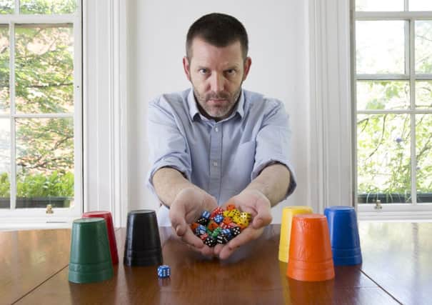 Ian Smith with his Perudo game at home in Glasgow. Picture: Robert Perry