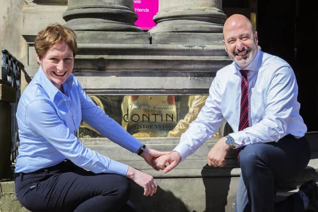Carina and Victor Contini plan to leave their spectral guest a few nibbles once their latest cafe is up and running. Picture: Malcolm McCurrach