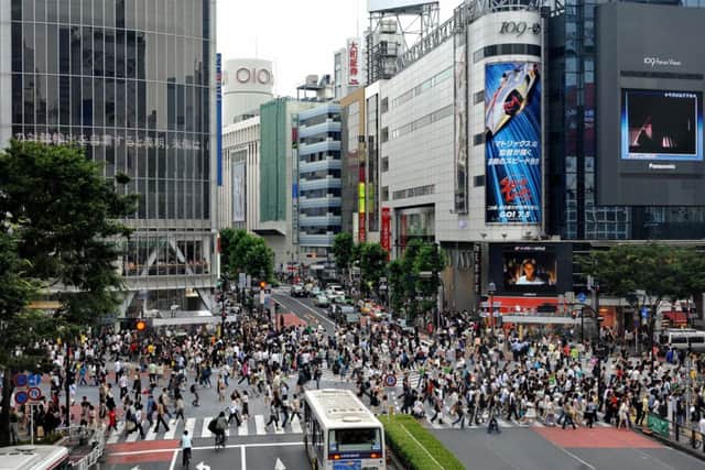 Shibuya crossing in the heart of Tokyo  Japan watchers await results of the countrys latest measures. Picture: Getty