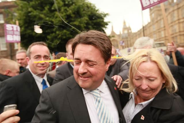 Nick Griffin, leader of the British National Party abandon a press conference in London in 2009 after being pelted with eggs. Picture: Getty