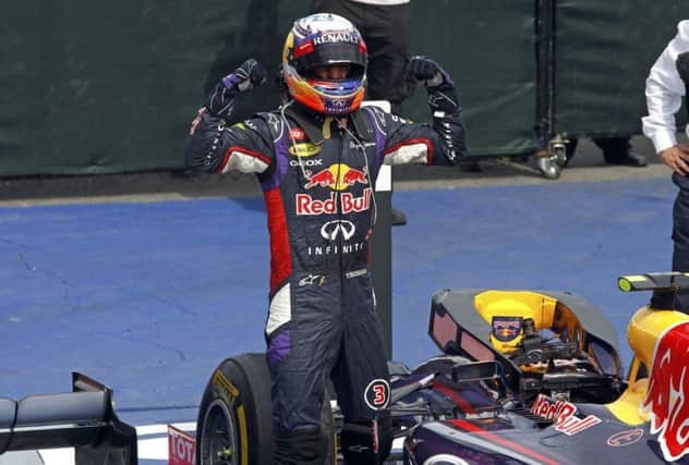 Daniel Ricciardo celebrates his first F1 grand prix win in Montreal yesterday following a dramatic day of action. Picture: Reuters
