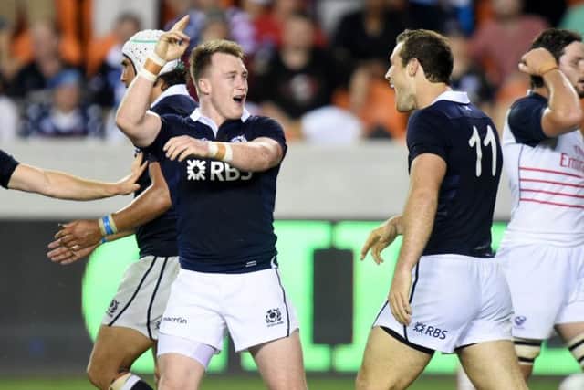 Stuart Hogg (left) celebrates his try with team-mate Tim Visser. Picture: SNS