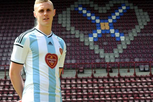 Kevin McHattie models the new FoH-sponsored Hearts away kit. Picture: Lisa Ferguson