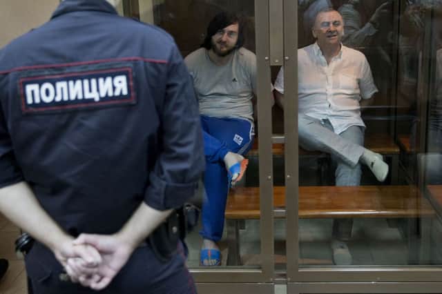 Ibragim Makhmudov, left, and LomAli Gaitukayev in the dock. Picture: AP