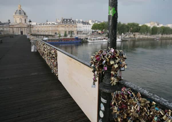 Lovers have been attacking padlocks to the historic bridge since 2008. Picture: Getty