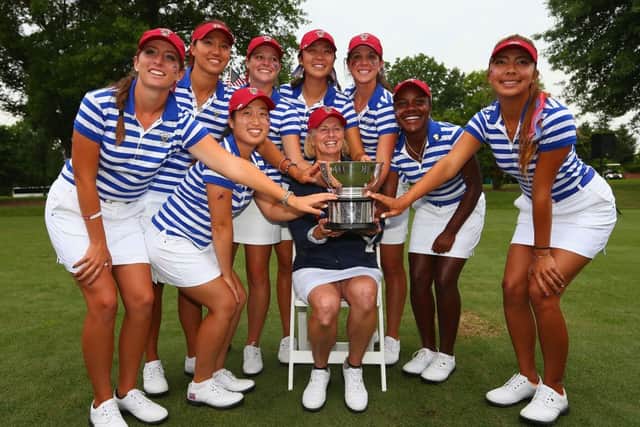 The victorious US team show off the Curtis Cup. Picture: Getty