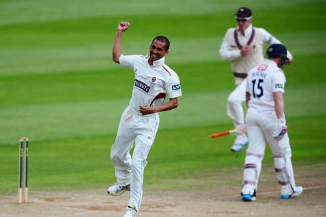 A thrilled Alfonso Thomas celebrates his fourth wicket as Matt Machan trudges off. Picture: Getty