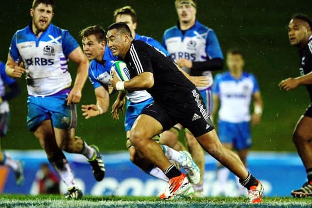 New Zealand replacement Leon Fukofuka goes on the charge during his sides demolition of Scotland. Picture: Getty