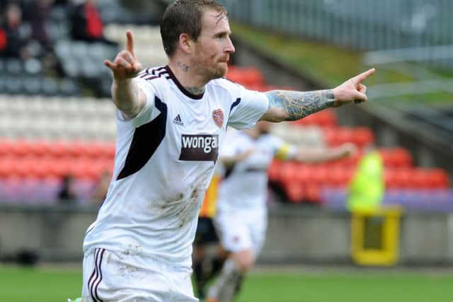 Ryan Stevenson celebrates a goal against Partick Thistle, the team he has now joined. Picture: TSPL