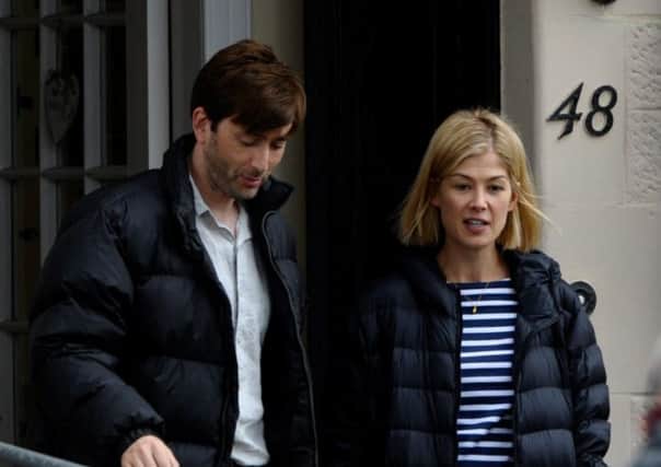 David Tennant and Rosamund Pike on the set of What We Did On Our Holiday. Picture: Hemedia