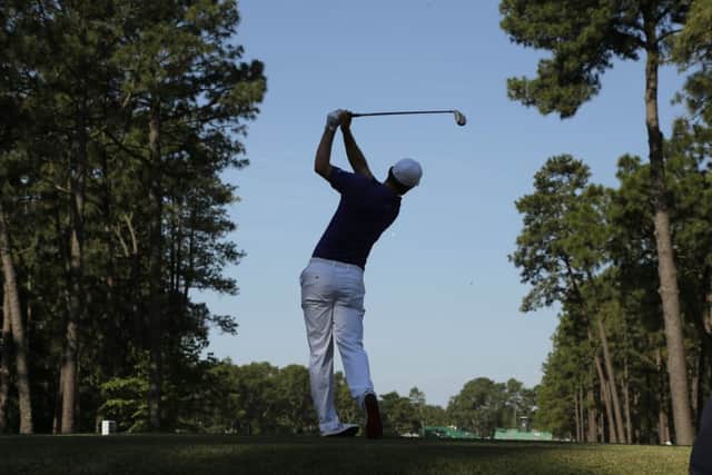 Englands defending champion Justin Rose tees off at the 11th during a practice round at Pinehurst. Picture: AP