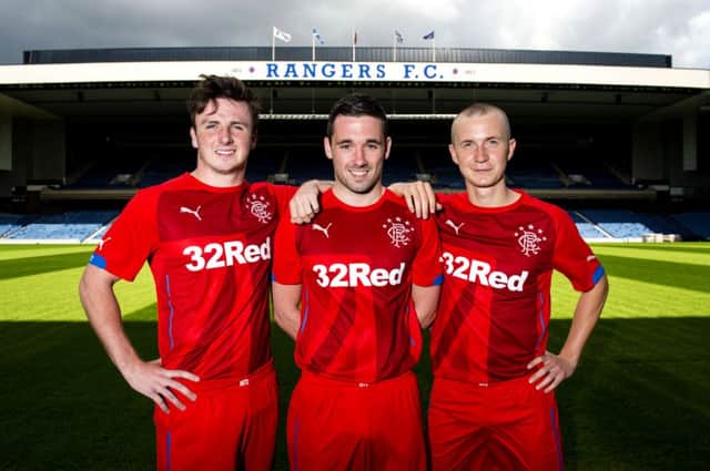 Calum Gallagher, Nicky Clark and Robbie Crawford launched the new 2014/2015 Rangers third kit. Picture: SNS