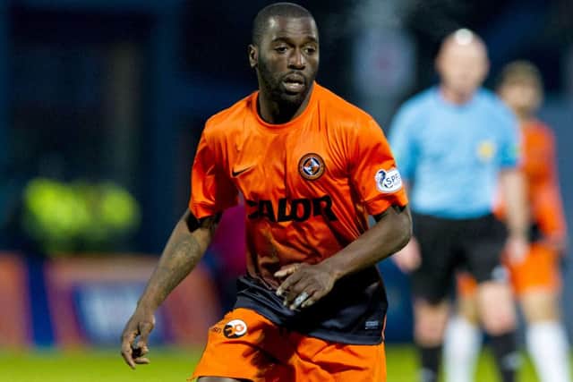 Morgaro Gomis in action for Dundee United against Ross County in January 2014. Picture: SNS
