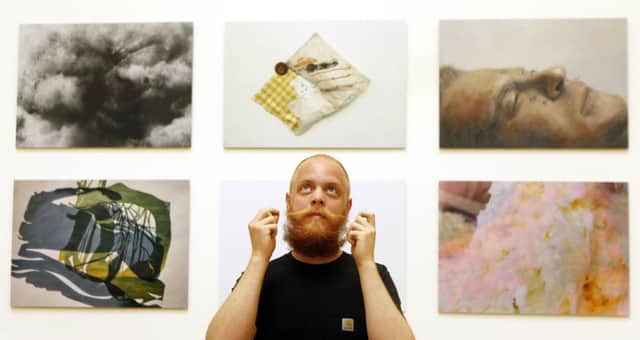 Student Alexander Ahaukrogh Jensen with work form the Glasgow School of Art (GSA) degree show. Picture: PA