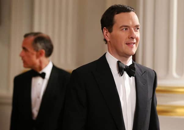 Chancellor George Osborne arrives at the Mansion House with the Banks Mark Carney. Picture: Getty