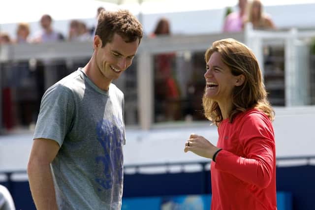 Andy Murray shares a joke with coach Amelie Mauresmo. Picture: Getty