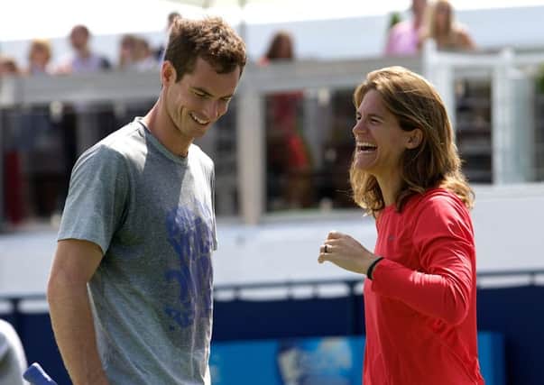 Andy Murray shares a joke with coach Amelie Mauresmo. Picture: Getty