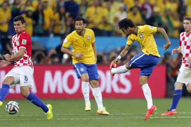 Neymar shoots home to equalise for Brazil in last nights opening match of the World Cup. Picture: AP