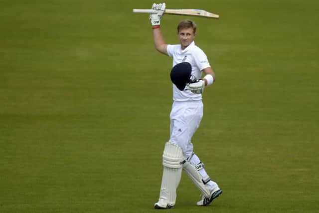 Joe Root celebrates after scoring 200 not out, his highest Test score. Picture: Reuters
